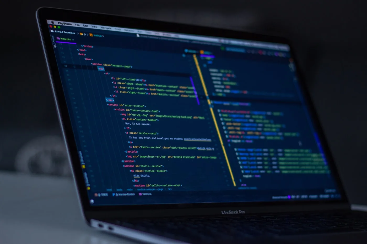 Developer writing custom code for a business website